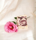 Gardenia Bar handmade floral soap featuring Brazilian purple clay, rose petals, and a luxurious gardenia fragrance.